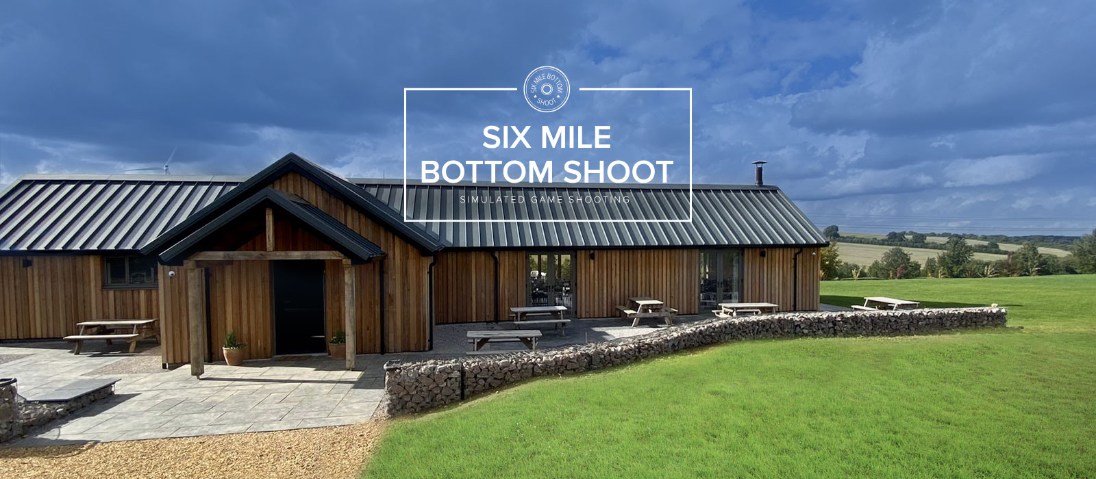 Six Mile Bottom lodge on a sunny day