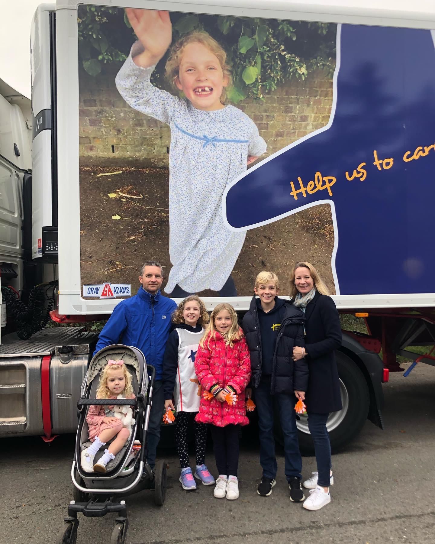 The Clarke family in front of Mimi's lorry